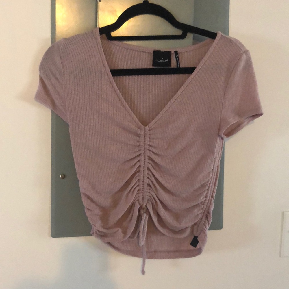 Out from under lavender top